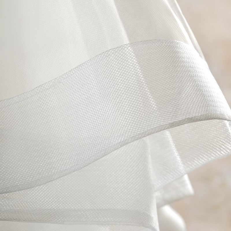 Close-up of a white horsehair trim of a bridal veil